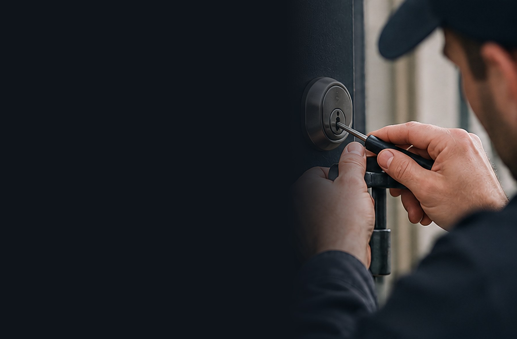 Locksmith working on a door lock